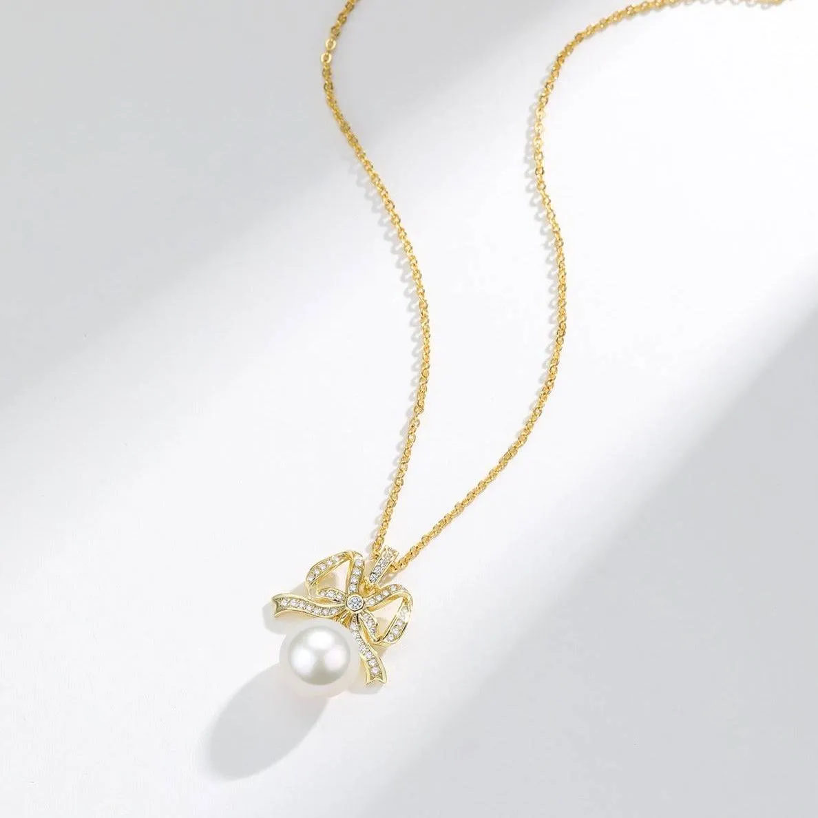 10-11mm Freshwater Pearl CZ Bowknot Pendant Necklace
