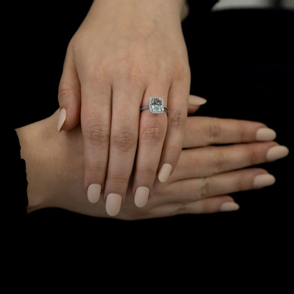 18ct White Gold 1.84ct Radiant Cut Aquamarine With 0.27ct Diamond Halo Ring