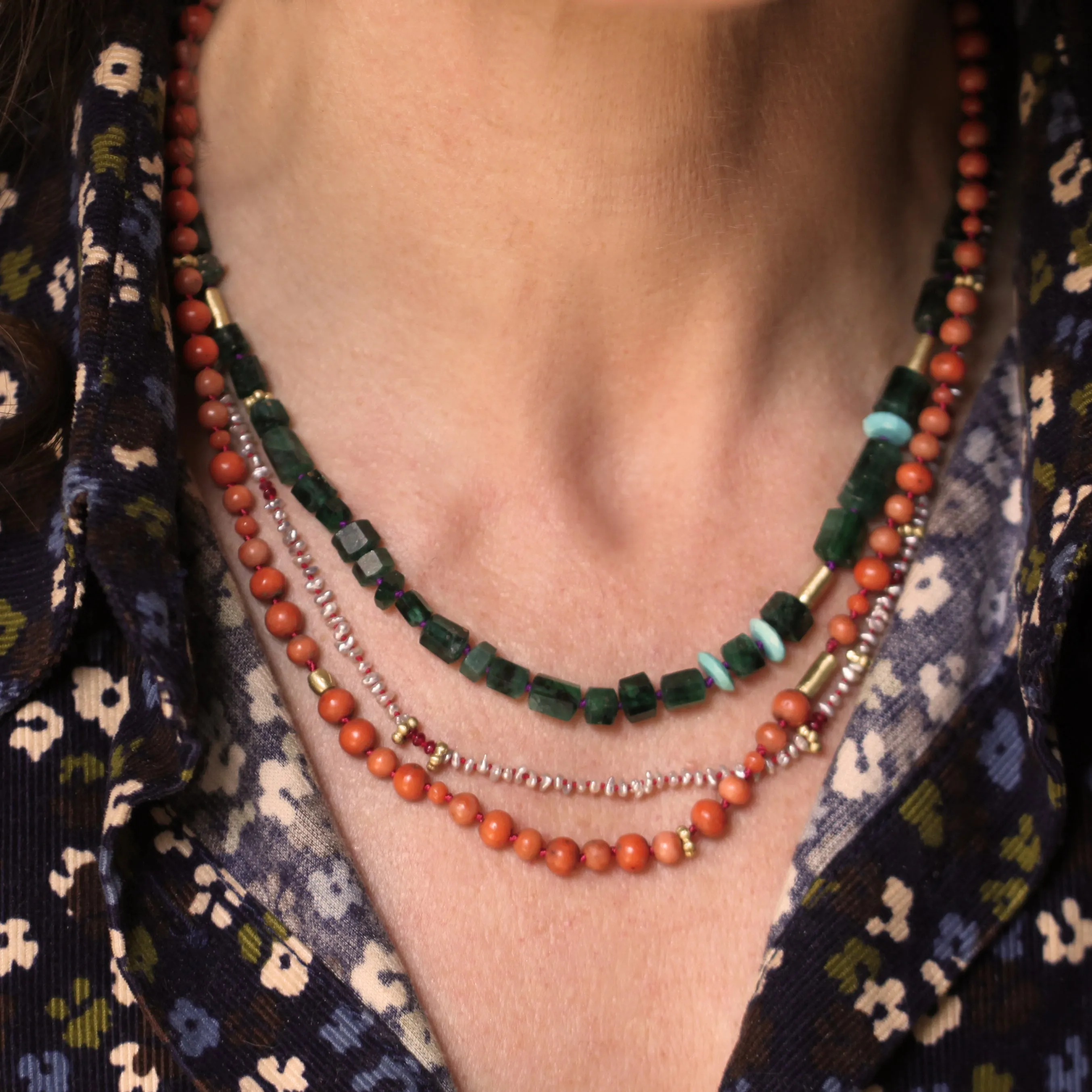 An Emerald   Turquoise and Gold Bead Necklace