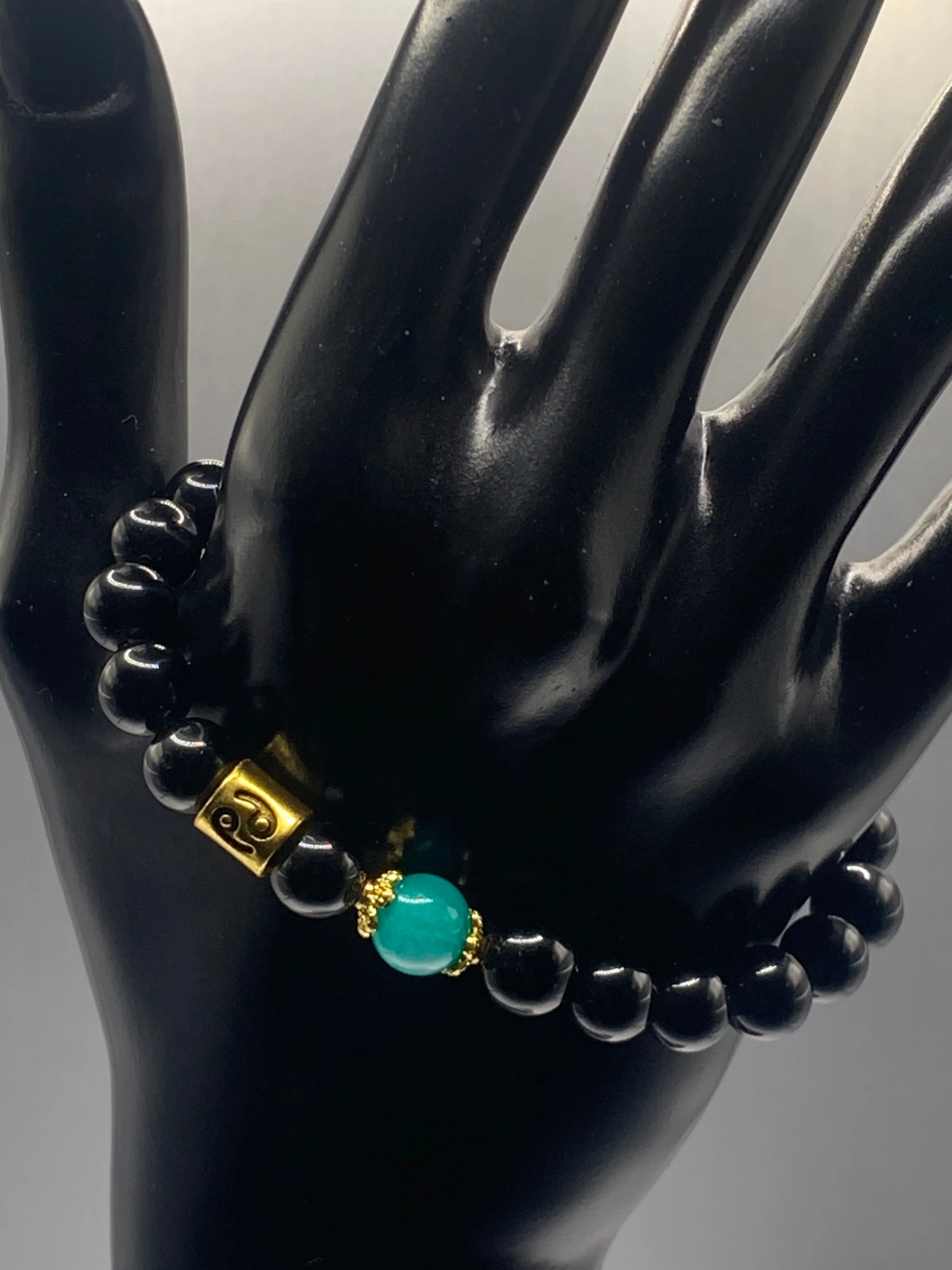 Cancer Zodiac black obsidian with aquamarine chalcedony semi precious stone/crystal elastic beaded bracelet with gold accents