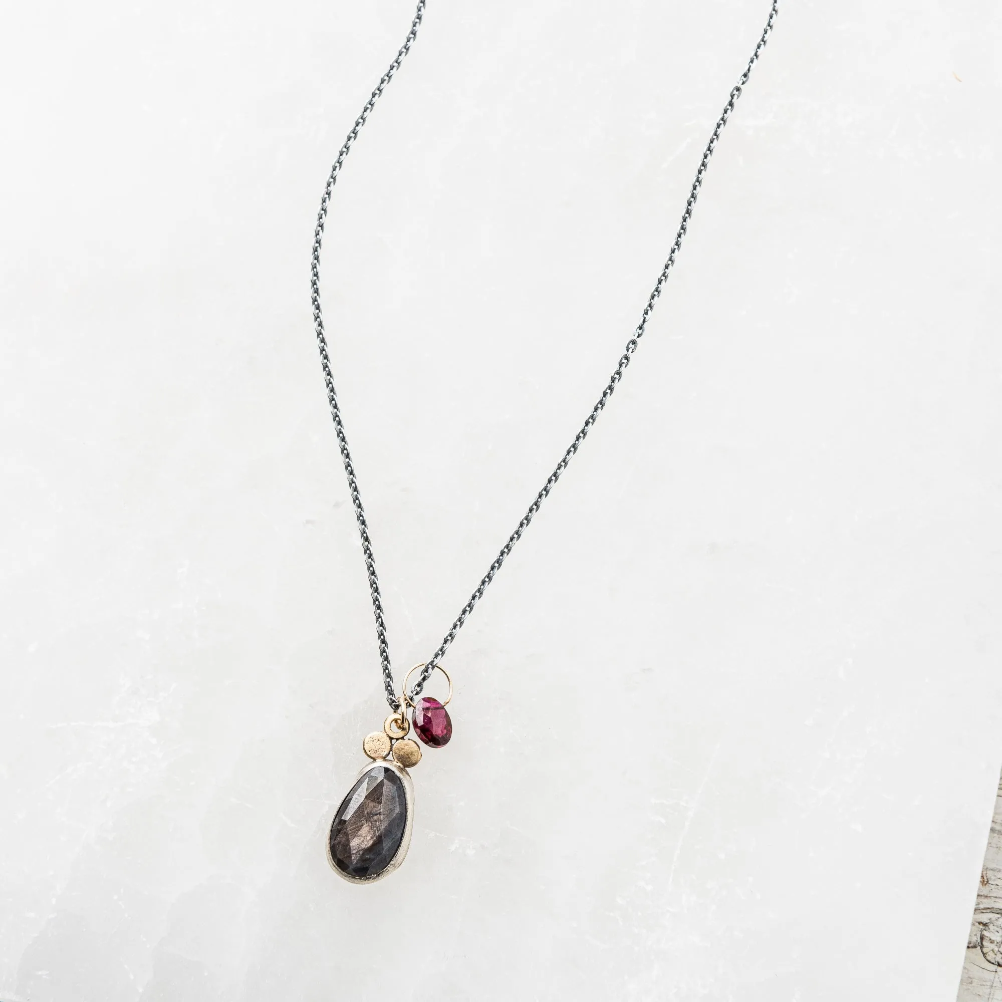 Chocolate Sapphire Pear Necklace with Red Garnet Charm