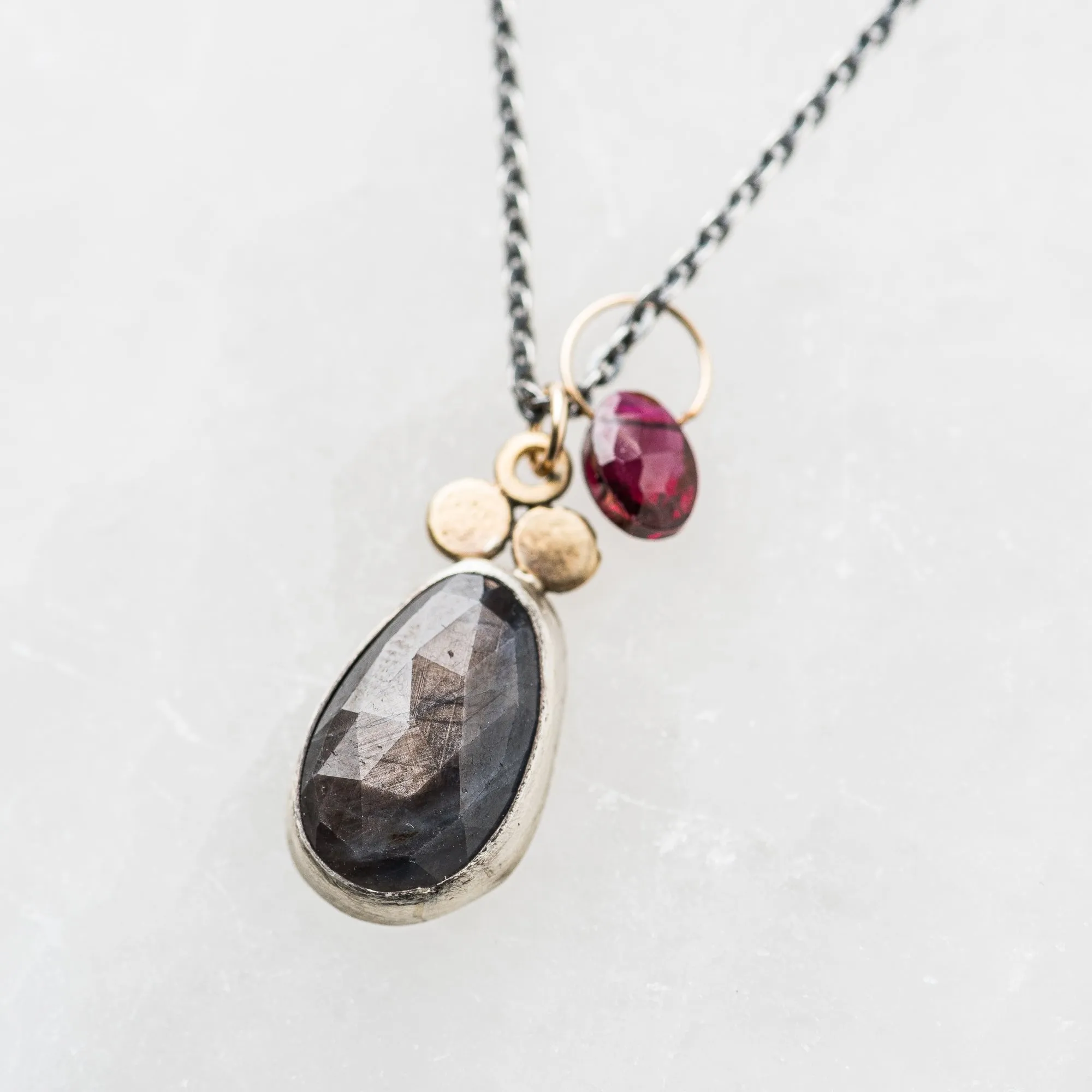 Chocolate Sapphire Pear Necklace with Red Garnet Charm