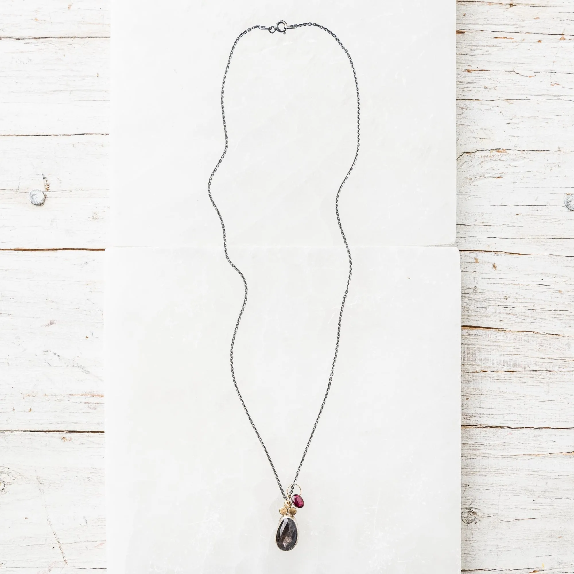Chocolate Sapphire Pear Necklace with Red Garnet Charm